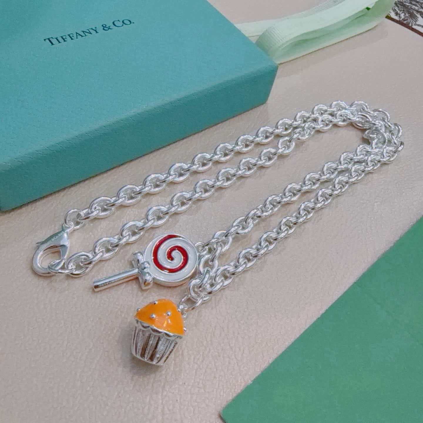 Tiffany & Co. Silver Charm Necklace with Lollipop and Cupcake Charms